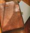 pochette en cuir marron pour MacBook. Titre: Étui en cuir pour MacBook.