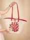 Sac Coralia en fibre végétale et broderie en raphia
